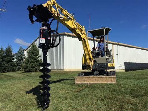 mini excavator auger attatchment|mini excavator with auger rental.